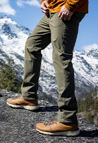 Man wearing the Ascent-Glide Pant by Beyond Clothing.