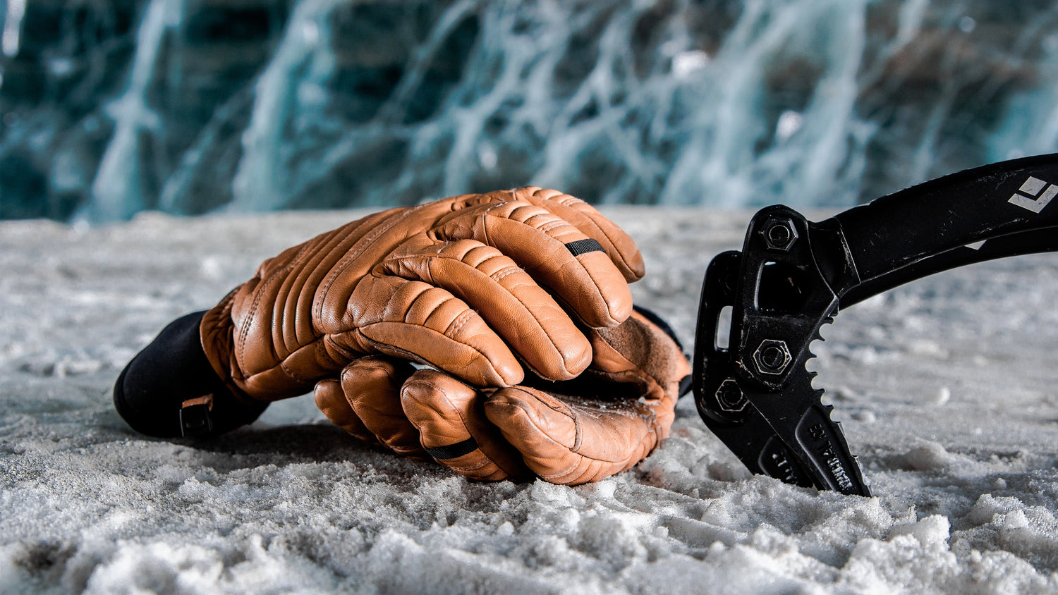 Image of a pair of the Beyond Guide Gloves in an ice cave.