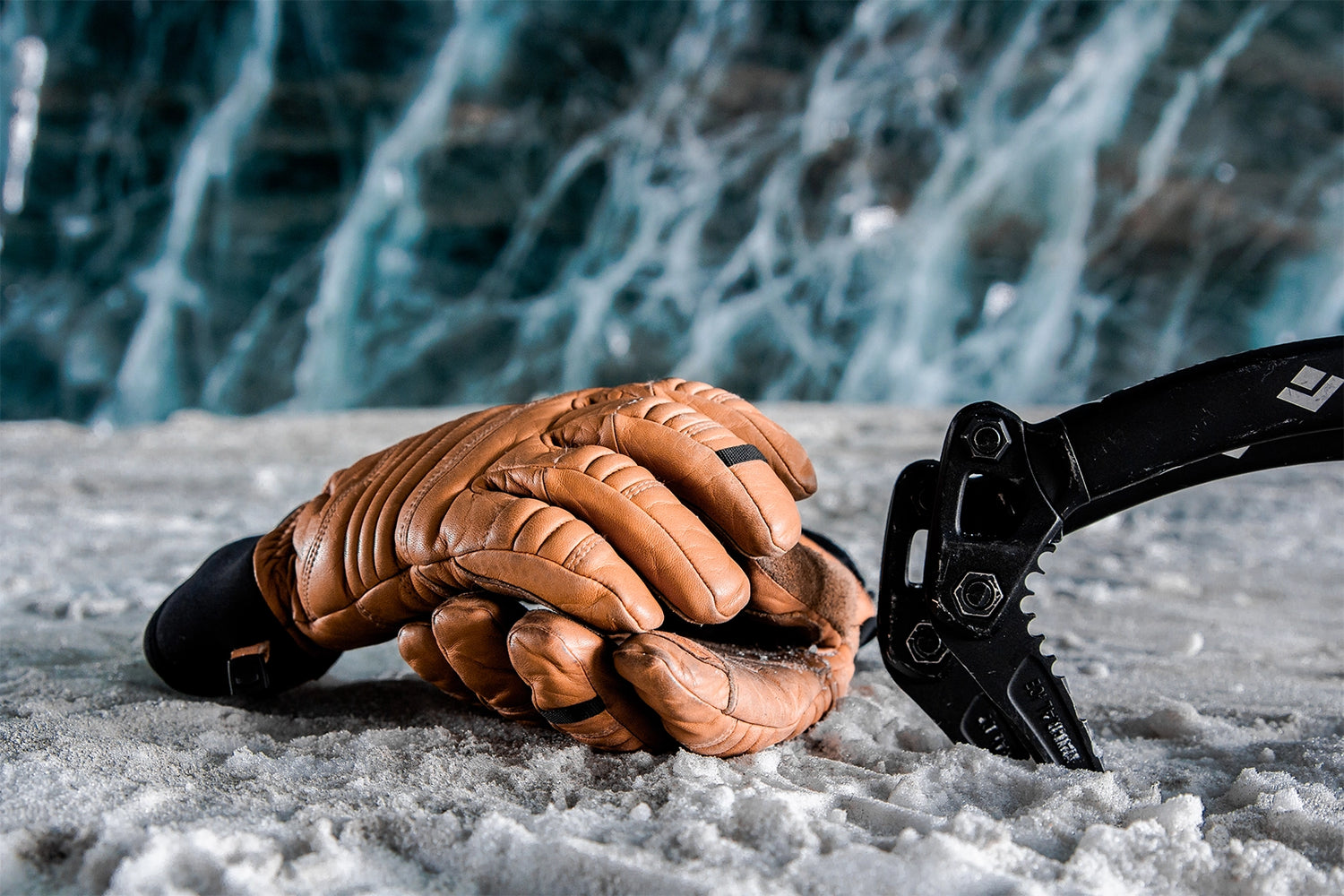 Image of a pair of the Beyond Guide Gloves in an ice cave.