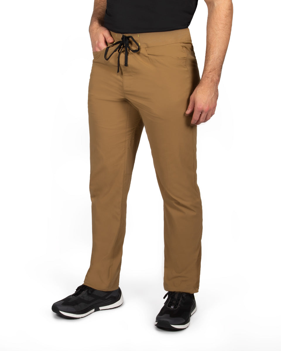 Male model wearing the TarnGood Pant and SolarSwift Tech-T. 