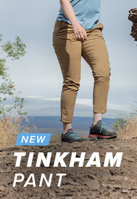 Women wearing the Tinkham Pant in the color Tobacco while hiking.
