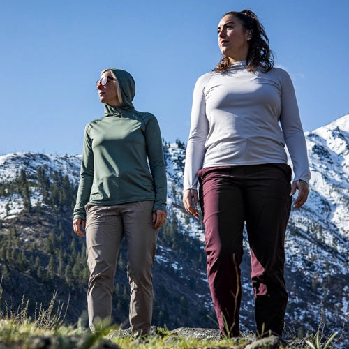 Two women wearing the Geo-T Hooded L.S. Shirt by Beyond Clothing.