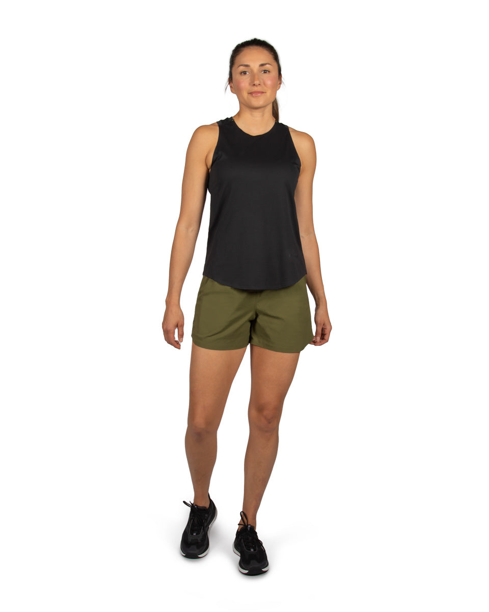 Woman model wearing the OlallieLoop Short and Feathers Tech-Tank. 