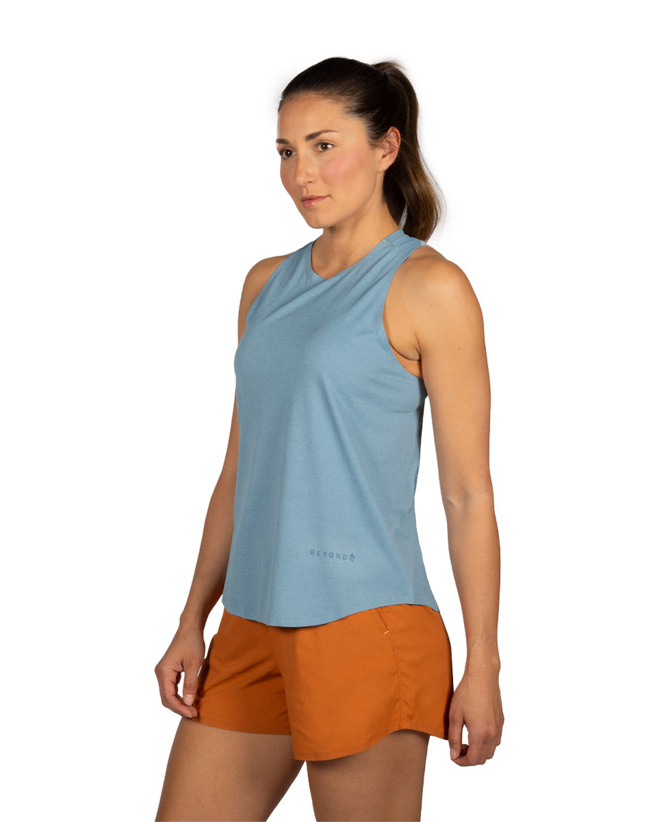 Woman model wearing the OlallieLoop Short and Feathers Tech-T. 